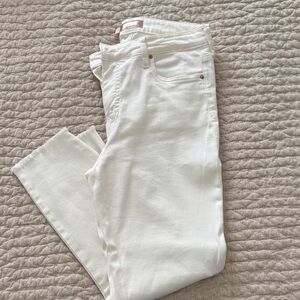 Kut from the Kloth white straight leg slim jeans with frayed hem.